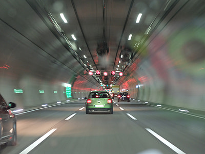 timelapse photography of vehicle inside tunnel