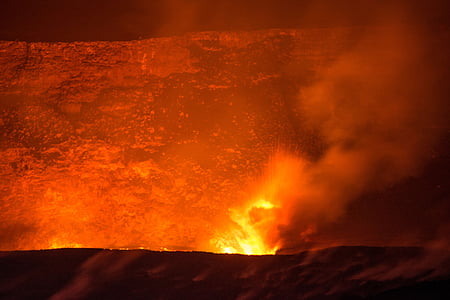 photo of mountain spitting lava