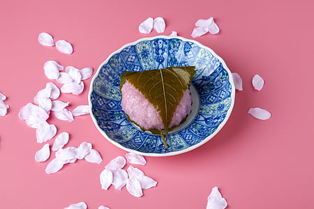 pink rice cake on blue bowl