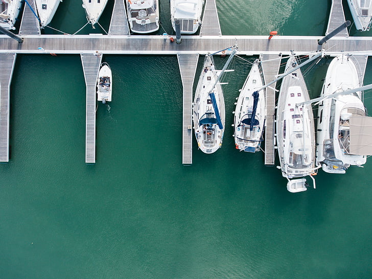 aerial photo of white yachts on water during daytime
