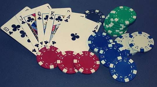 poker chips with playing cards