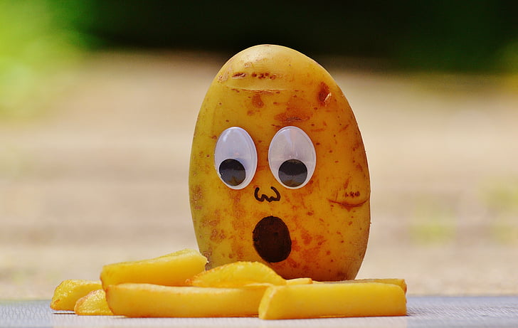 potato with googly eyes and French fries