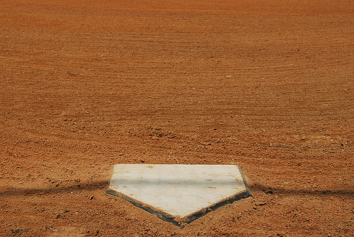 baseball base on brown soil