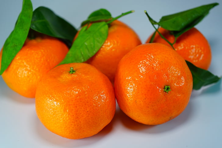 five orange fruits