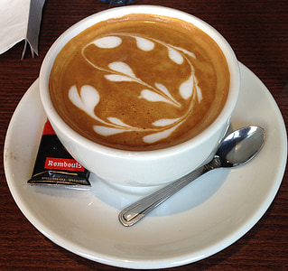 cappuccino in white ceramic teacup