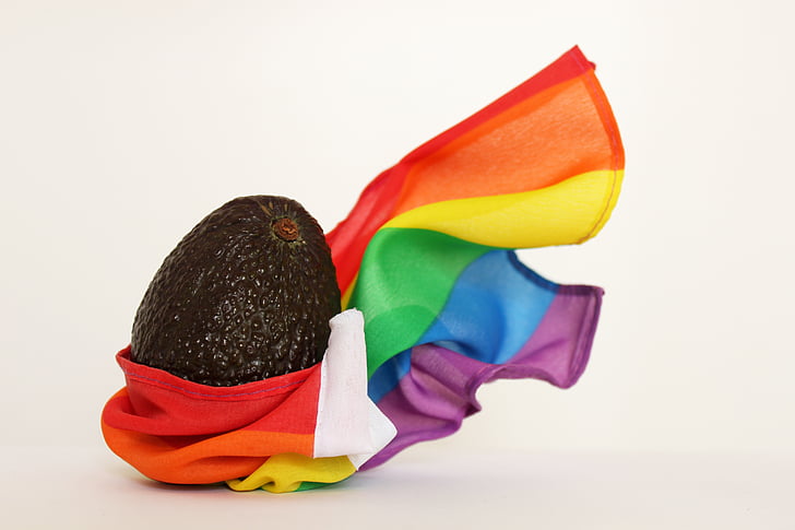 avocado fruit wrapped on LGBT flag