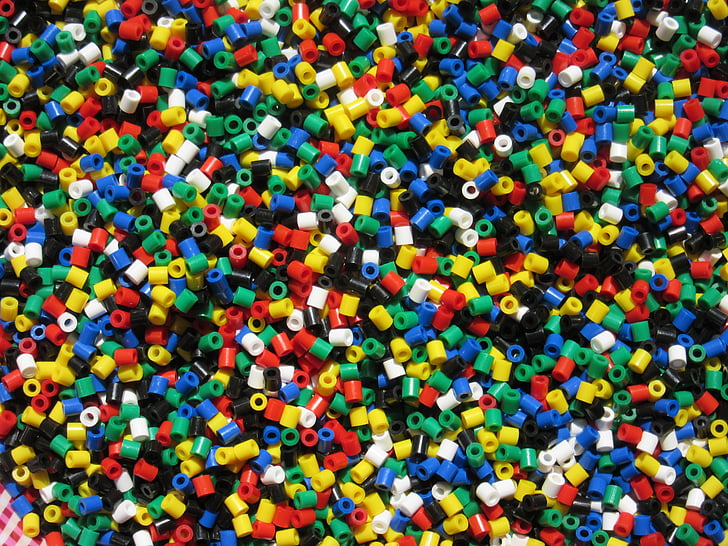 Small Decorative Colorful Beads In Plastic Containers Stock Photo, Picture  and Royalty Free Image. Image 40649587.