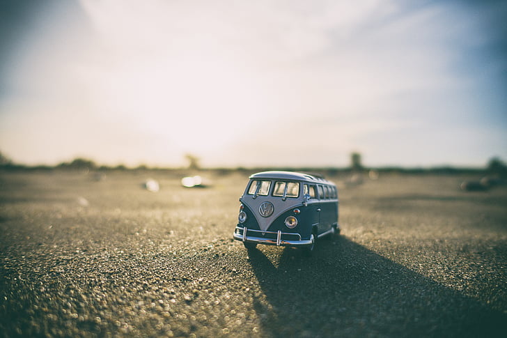 selective focus photography of mini Volkswagen T1 van on road during daytime