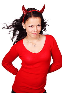 woman wearing devil headband and v-neck shirt