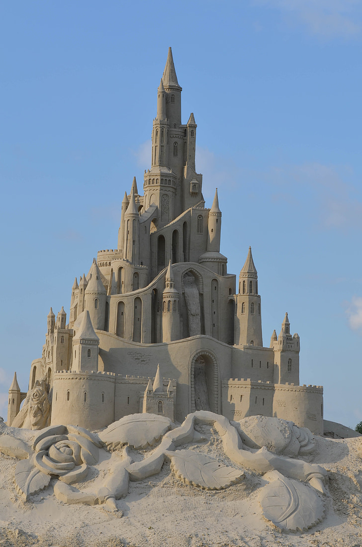 sand castle under clear blue sky