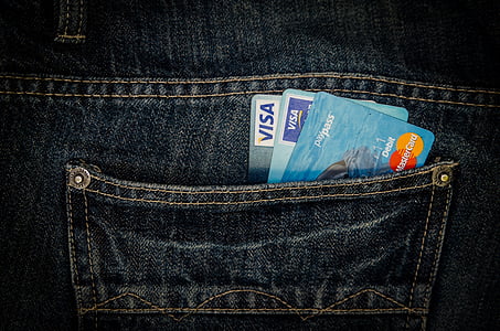three blue Mastercard and Visa cards