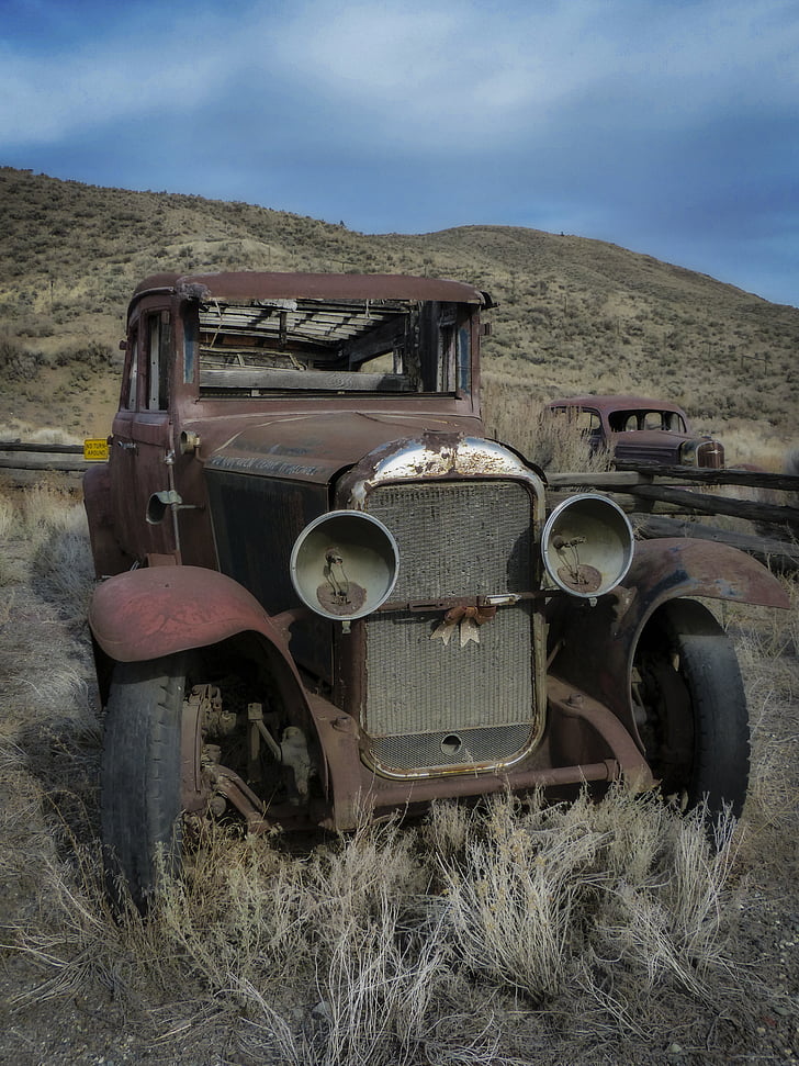 abandoned vintage brown car during daytime