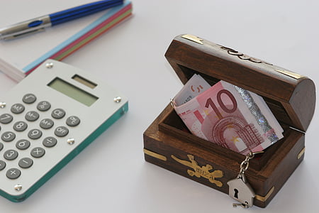 10 euro banknote inside brown trinket