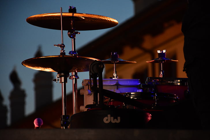 selective focus photo of brown cymbals