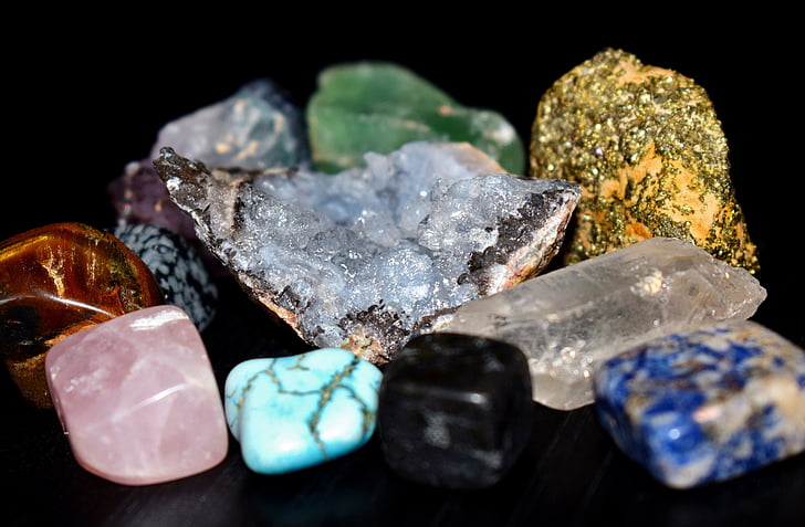 several assorted-color gemstones