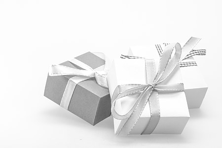 two white and one gray gift boxes