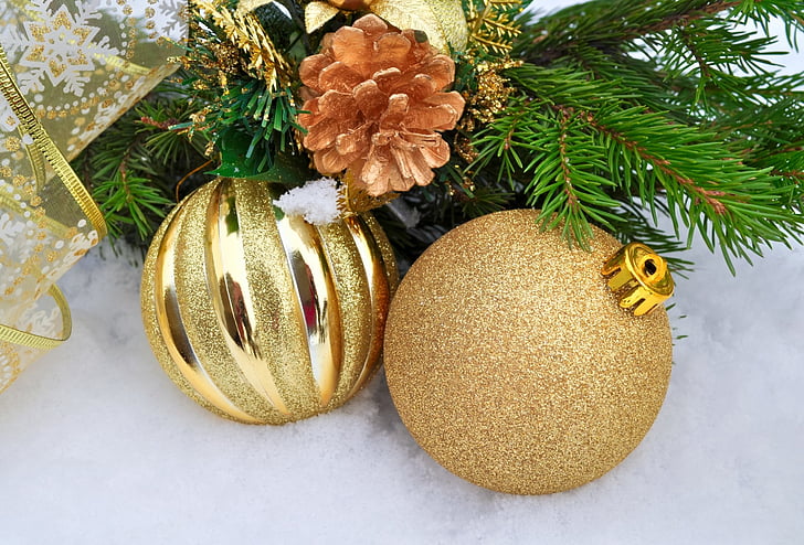 two gold Christmas baubles