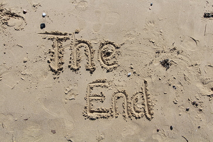 The End sand writing