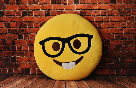 round yellow emoji pillow