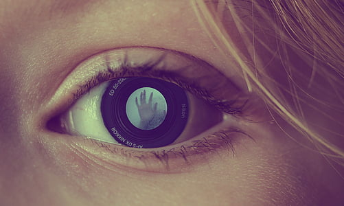 macro photography of person's eye