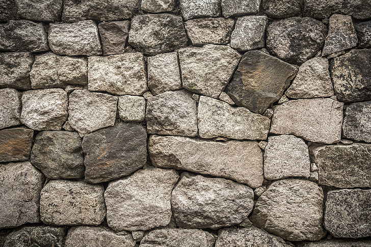 closeup photo of grey concrete bricks